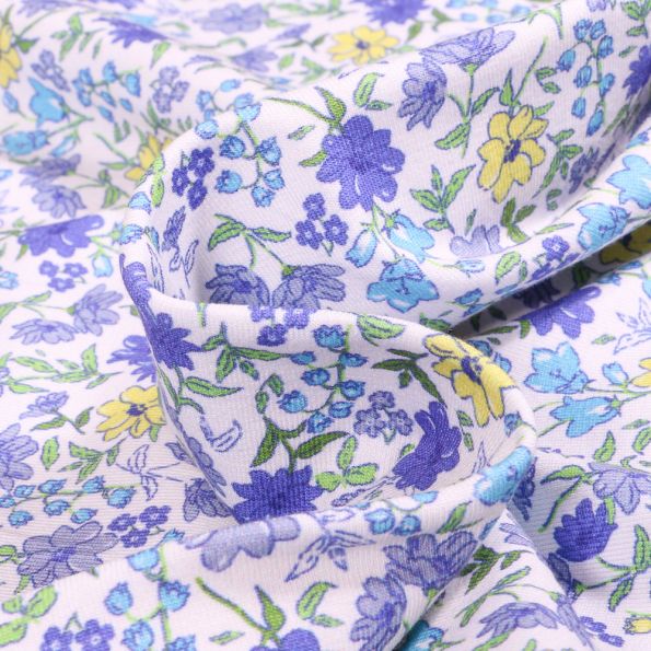 Tissu Jersey Coton Sweet Flower Florentine violette sur fond Blanc - Par 10 cm