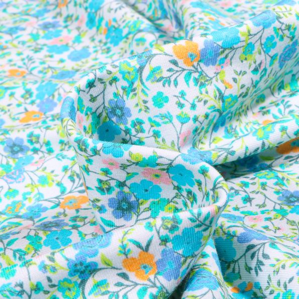 Tissu Jersey Coton Sweet Flower Lillie turquoise sur fond Blanc - Par 10 cm