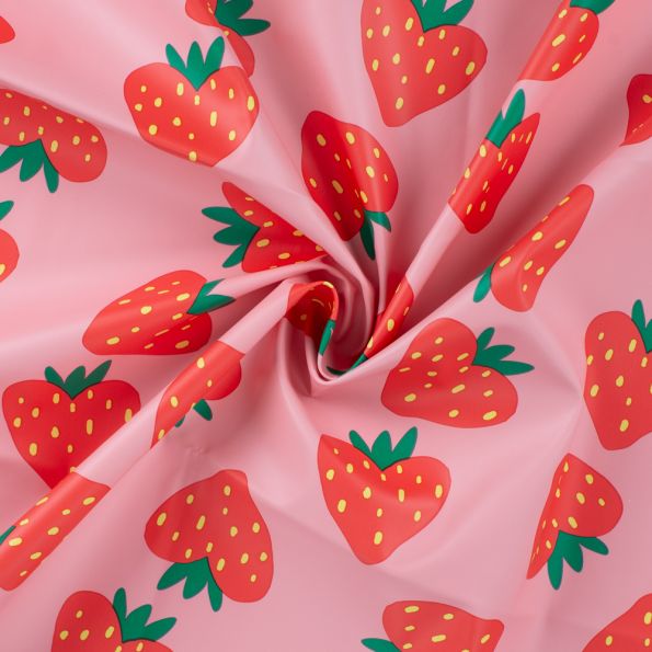 Tissu Imperméable Fraises sur fond Rose - Par 10 cm