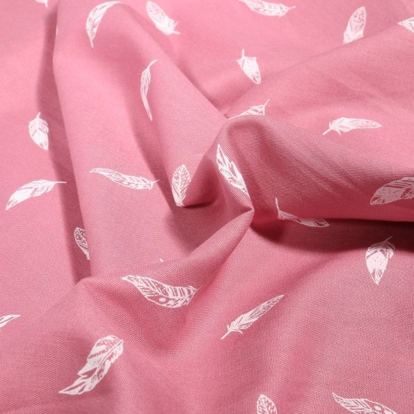 Tissu Coton imprimé Petites plumes sur fond Rose - Par 10 cm