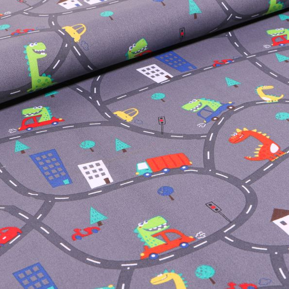 Tissu Coton imprimé Dinosaures en ville sur fond Gris anthracite - Par 10 cm