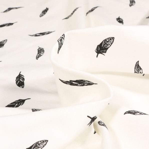 Tissu Jersey Coton Camille Plumes noires sur fond Blanc cassé - Par 10 cm