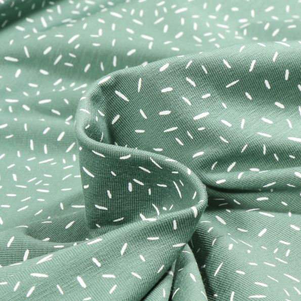 Tissu Jersey Coton Camille Confettis sur fond Vert amande - Par 10 cm