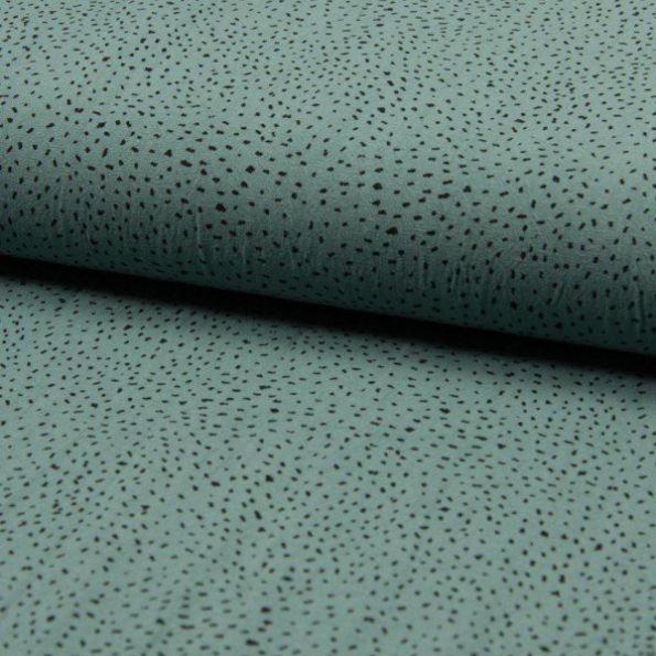 Tissu Coton lavé  Confettis noirs sur fond Vert d'eau - Par 10 cm