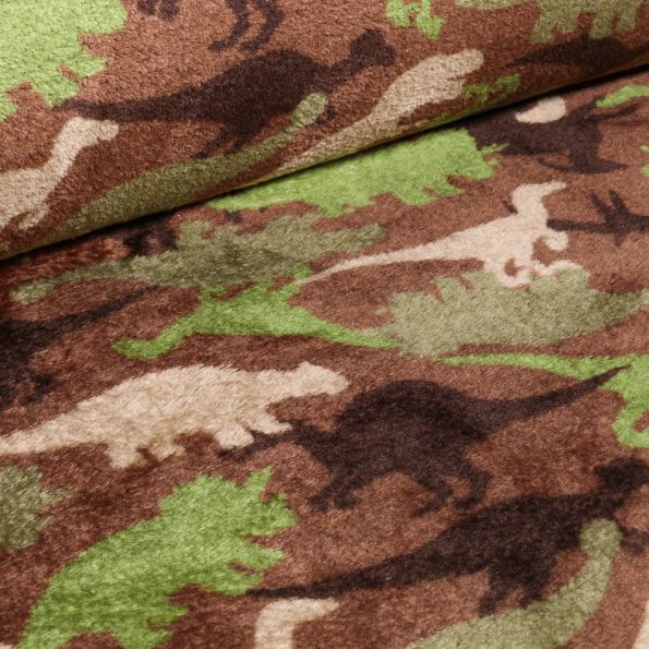 Tissu Doudou Dinosaures camouflage sur fond Marron - Par 10 cm