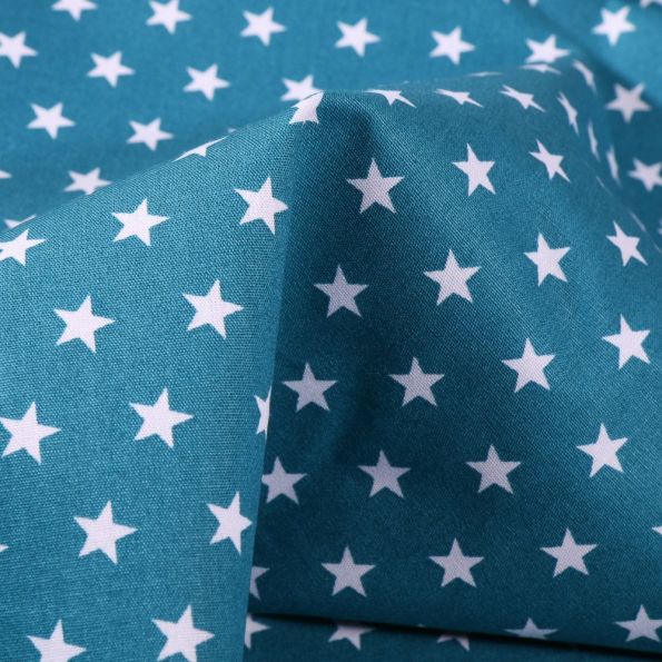 Tissu Coton imprimé Etoiles 1 cm sur fond Bleu pétrole - Par 10 cm