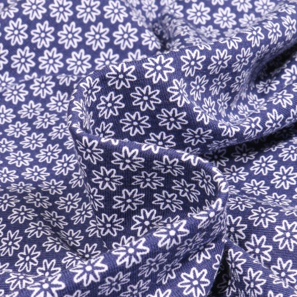 Tissu Jersey Coton Fleurs blanches sur fond Bleu marine - Par 10 cm