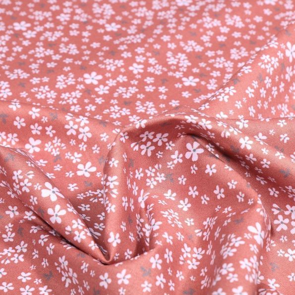 Tissu Coton imprimé Bio June sur fond Terracotta - Par 10 cm