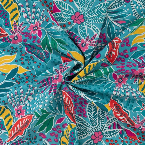 Tissu Viscose extensible Floral exotique sur fond Bleu lagon - Par 10 cm