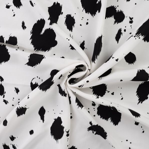 Tissu Viscose imprimé Taches noires éclatées sur fond Blanc - Par 10 cm