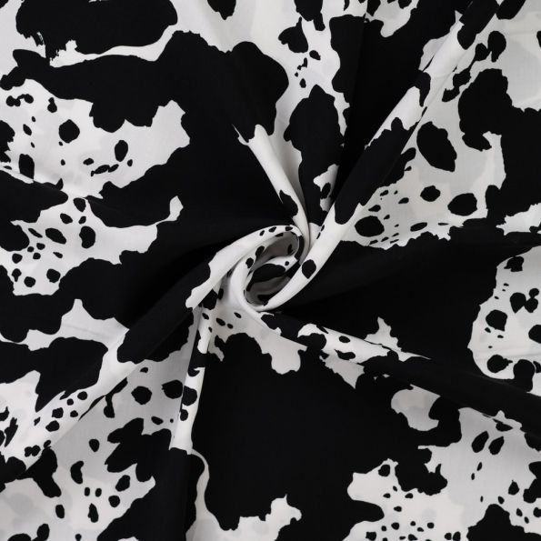 Tissu Viscose imprimé Taches noires sur fond Blanc - Par 10 cm