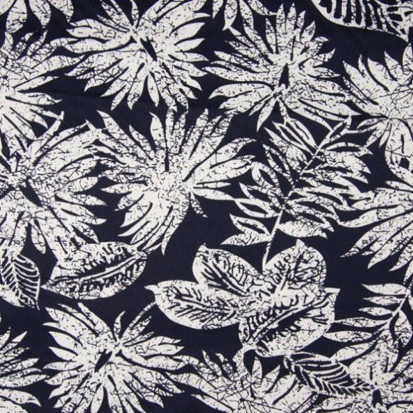Tissu Coton Satiné extensible Feuillages blancs sur fond Bleu marine - Par 10 cm