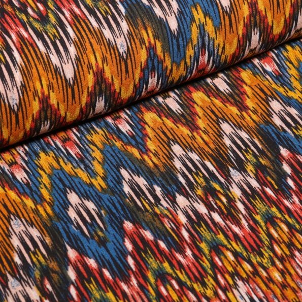 Tissu Crêpe georgette Chevrons jaunes et bleus sur fond Blanc - Par 10 cm