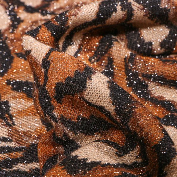 Tissu Maille lurex Feuilles ocre sur fond Beige - Par 10 cm