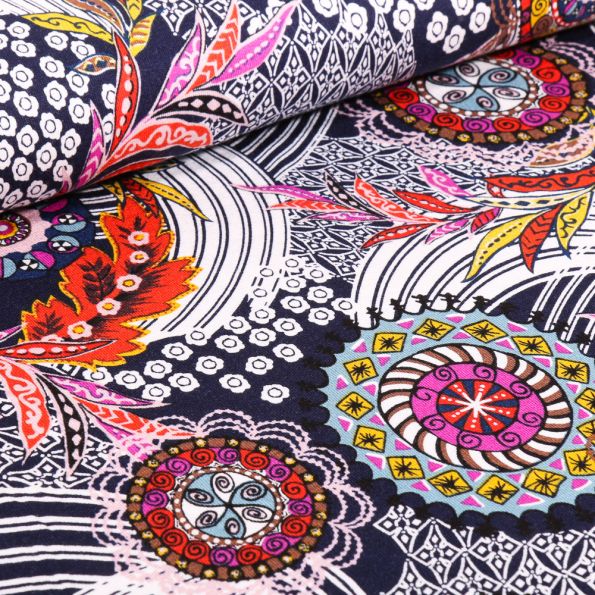 Tissu Jersey Viscose  Rosaces colorées sur fond Bleu marine - Par 10 cm