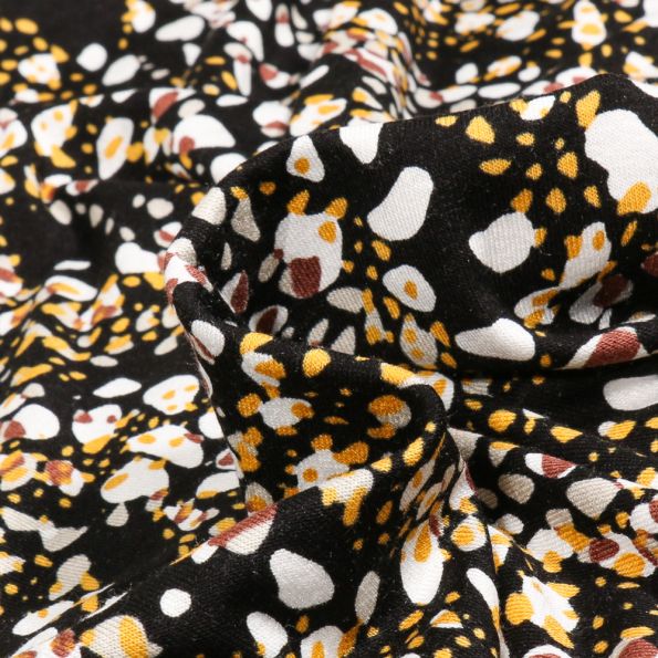 Tissu Jersey Viscose Svea sur fond Noir - Par 10 cm