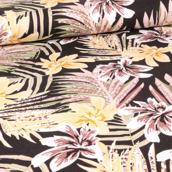 Tissu Jersey Viscose Feuilles tropicales colorées sur fond Noir - Par 10 cm