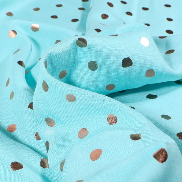 Tissu Viscose légère Pois métallisés rose gold sur fond Bleu turquoise - Par 10 cm