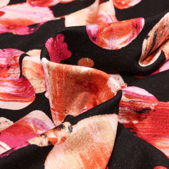 Tissu Jersey Viscose  Planète rouge sur fond Noir - Par 10 cm