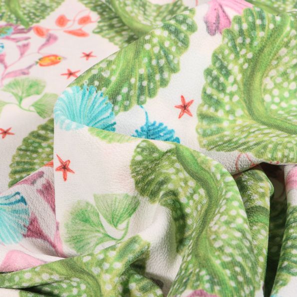 Tissu Crêpe Georgette Grandes feuilles tropicales sur fond Blanc - Par 10 cm