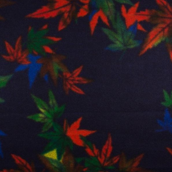 Tissu Caban Laine Feuilles orange et vertes sur fond Bleu marine - Par 10 cm