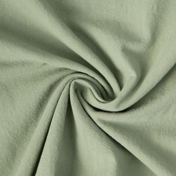 Tissu Coton Lavé aspect Lin uni Vert amande - Par 10 cm