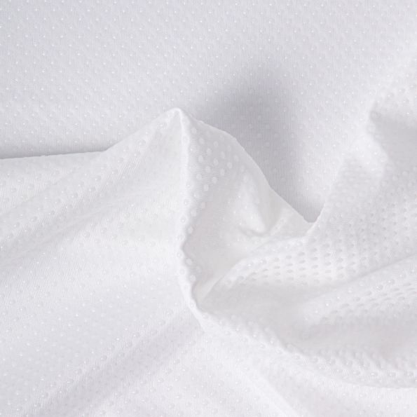 Tissu Antidérapant Doris dessous de tapis pois en relief Blanc - Par 10 cm