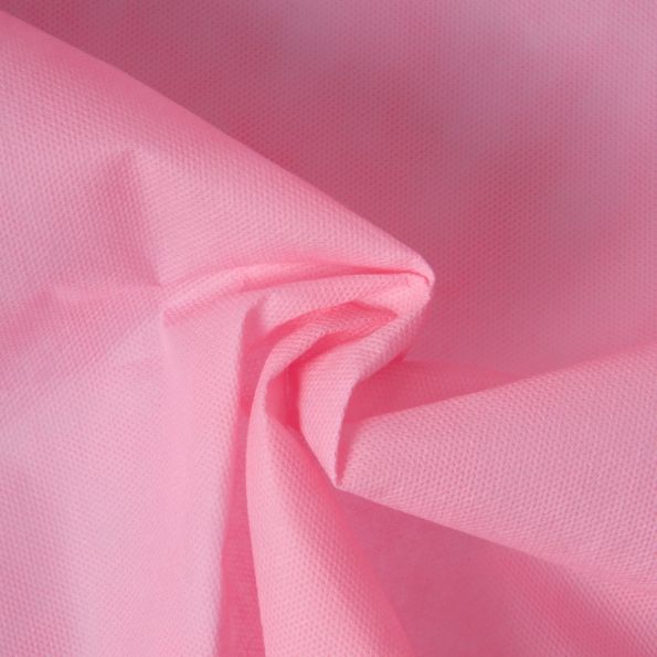 Tissu Fiesta Non tissé déperlant uni Rose - Par 10 cm