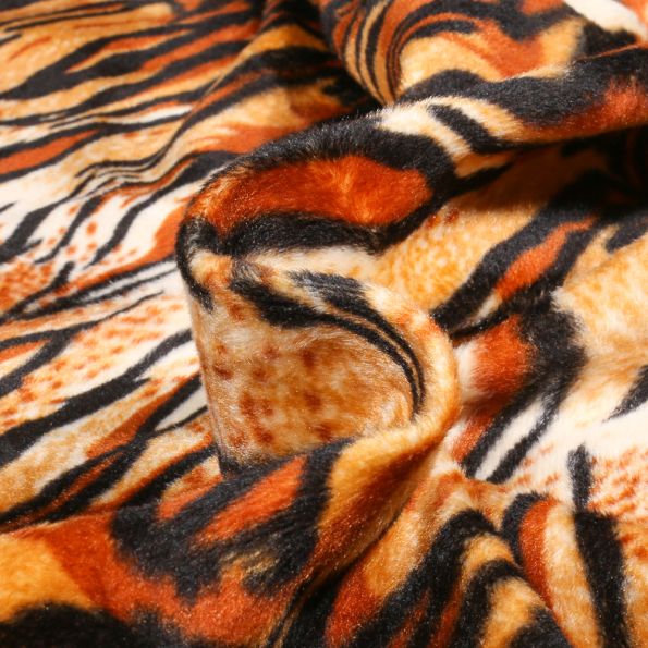 Tissu Velours Peau de bête Tigre sur fond Fauve - Par 10 cm
