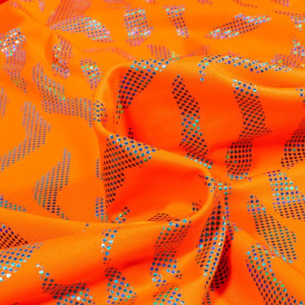 Tissu Jersey Lycra Zébra métalissé sur fond Orange fluo - Par 10 cm