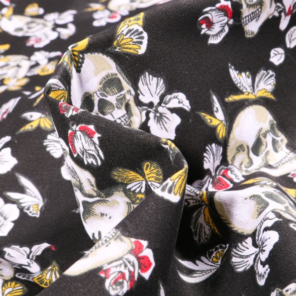 Tissu Coton imprimé Arty Têtes de mort et papillons sur fond Noir - Par 10 cm