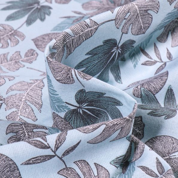 Tissu Coton imprimé Kanna sur fond Bleu ciel - Par 10 cm