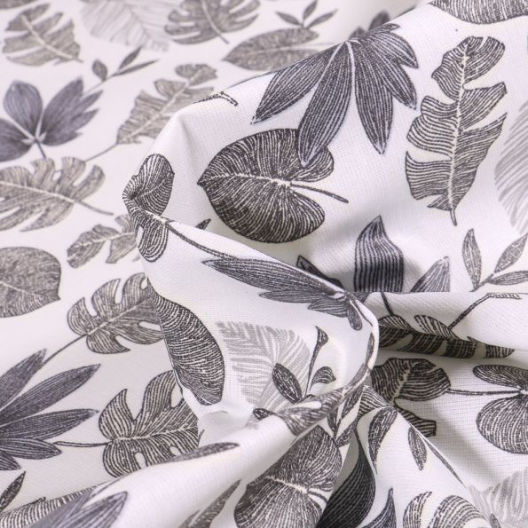 Tissu Coton enduit Sun leaves sur fond Gris - Par 10 cm