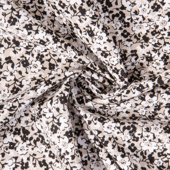 Tissu Toile Polycoton Liana fleurs Blanc et Noir sur fond Naturel - Par 10 cm