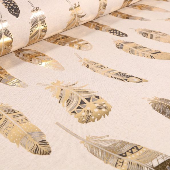 Tissu Toile de Coton Plumes Métallisées Or sur fond Beige - Par 10 cm