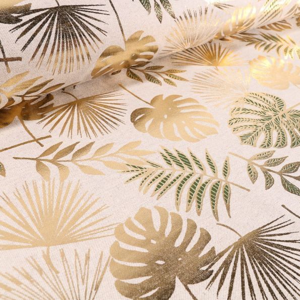 Tissu Toile de Coton Feuilles de palmiers Métallisées Vertes et dorés sur fond Beige - Par 10 cm