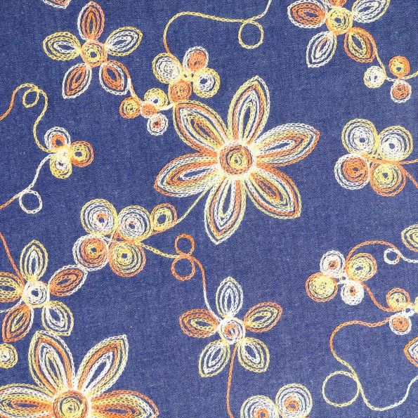 Tissu Denim Jeans léger brodé Fleurs Orange, beige et jaune sur fond Bleu jean - Par 10 cm