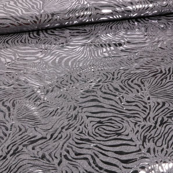 Tissu Jersey Coton zébré métallisé sur fond Gris chiné - Par 10 cm