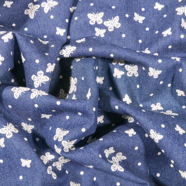 Tissu Jean élasthanne Butterfly sur fond Bleu - Par 10 cm
