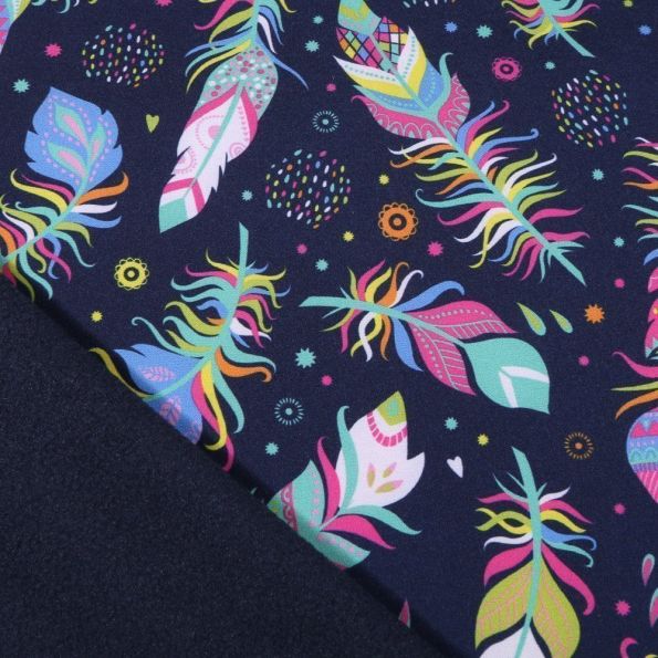 Tissu Softshell Plumes colorées sur fond Bleu marine - Par 10 cm