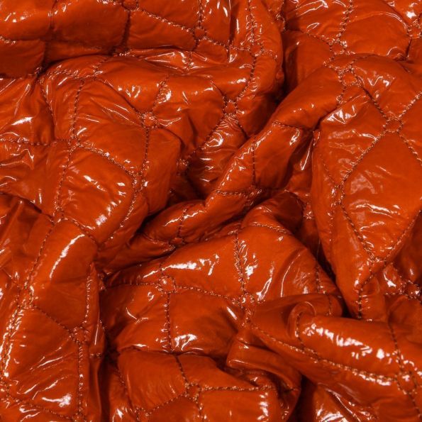 Tissu Doudoune matelassée Brillante sur fond Brique - Par 10 cm