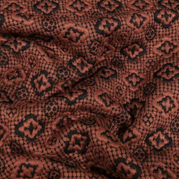 Tissu Jersey jacquard losanges et cercles noirs sur fond Marron - Par 10 cm