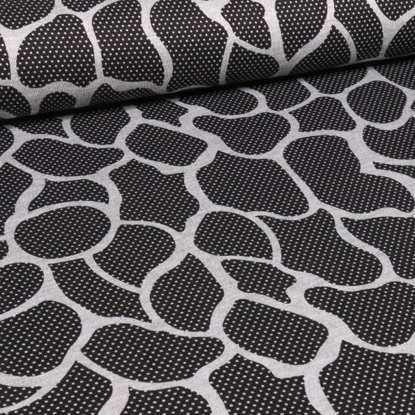 Tissu Jersey Milano Alvéoles blanches sur fond Noir - Par 10 cm
