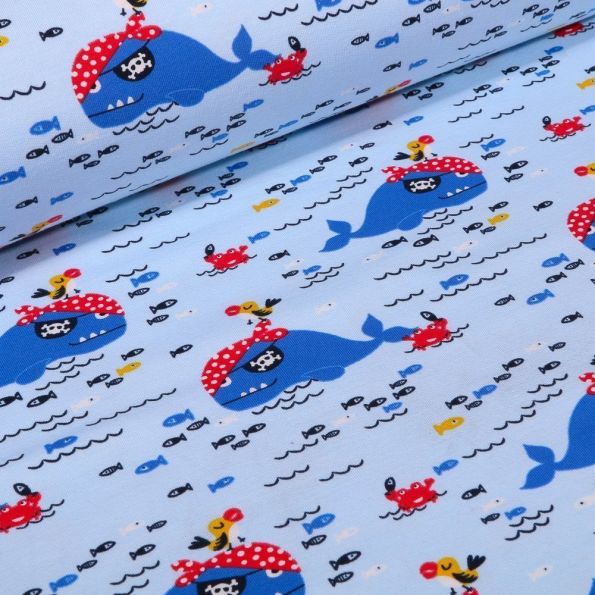 Tissu Jersey Coton envers gratté Baleines pirates sur fond Bleu ciel - Par 10 cm