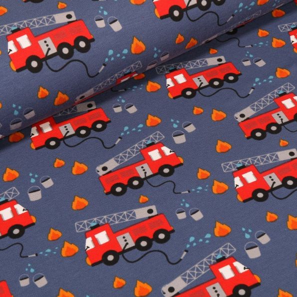 Tissu Jersey Coton Camions de pompiers échelles sur fond Bleu denim - Par 10 cm