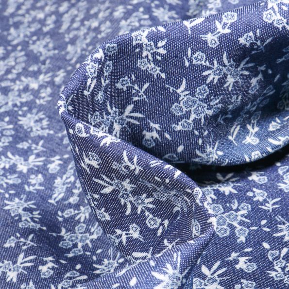 Tissu Jean Denim extensible Bouquets de fleurs blanches sur fond Bleu foncé - Par 10 cm