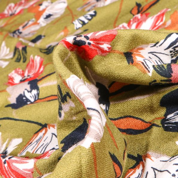 Tissu Jersey Viscose avec aspect crêpe Karine sur fond Vert - Par 10 cm