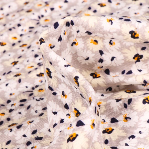 Tissu Jersey Viscose Fleurs et pâquerettes sur fond Gris clair - Par 10 cm