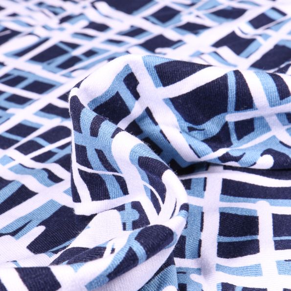 Tissu Jersey Viscose  Quadrillage abstrait blanc sur fond Bleu marine - Par 10 cm