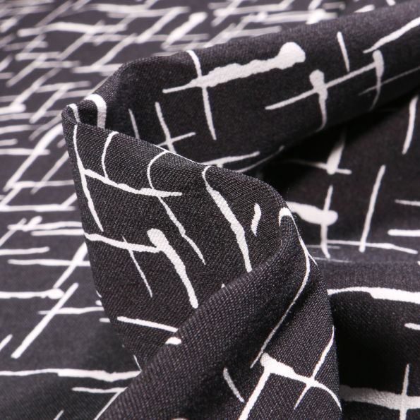 Tissu Bengaline Motifs abstraits sur fond Noir - Par 10 cm